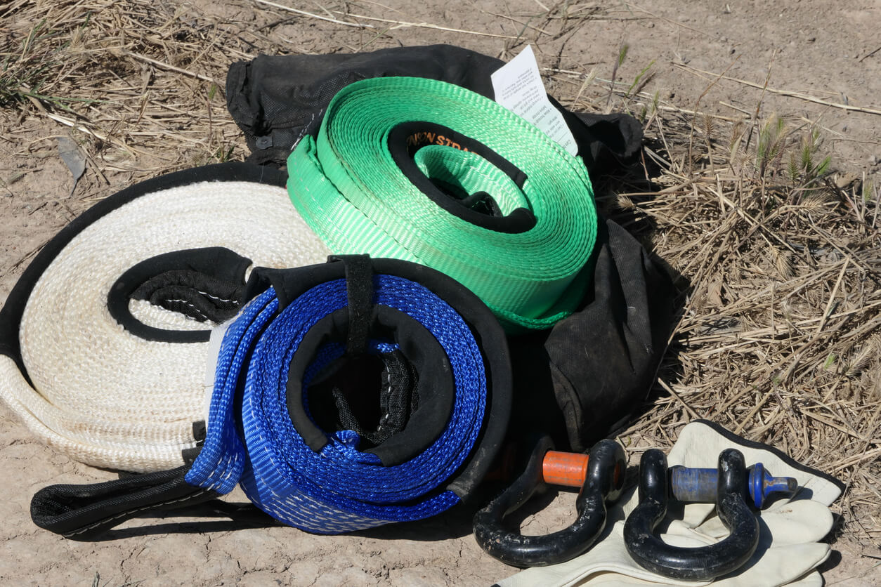 A selection of 4wd recovery gear including straps and shackles.