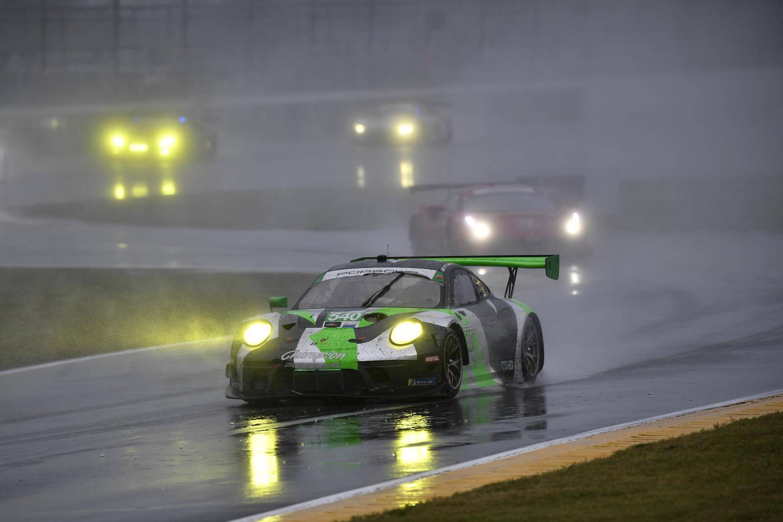 Porsche GT Cup car racing in the rain at IMSA 24hrs of Daytona