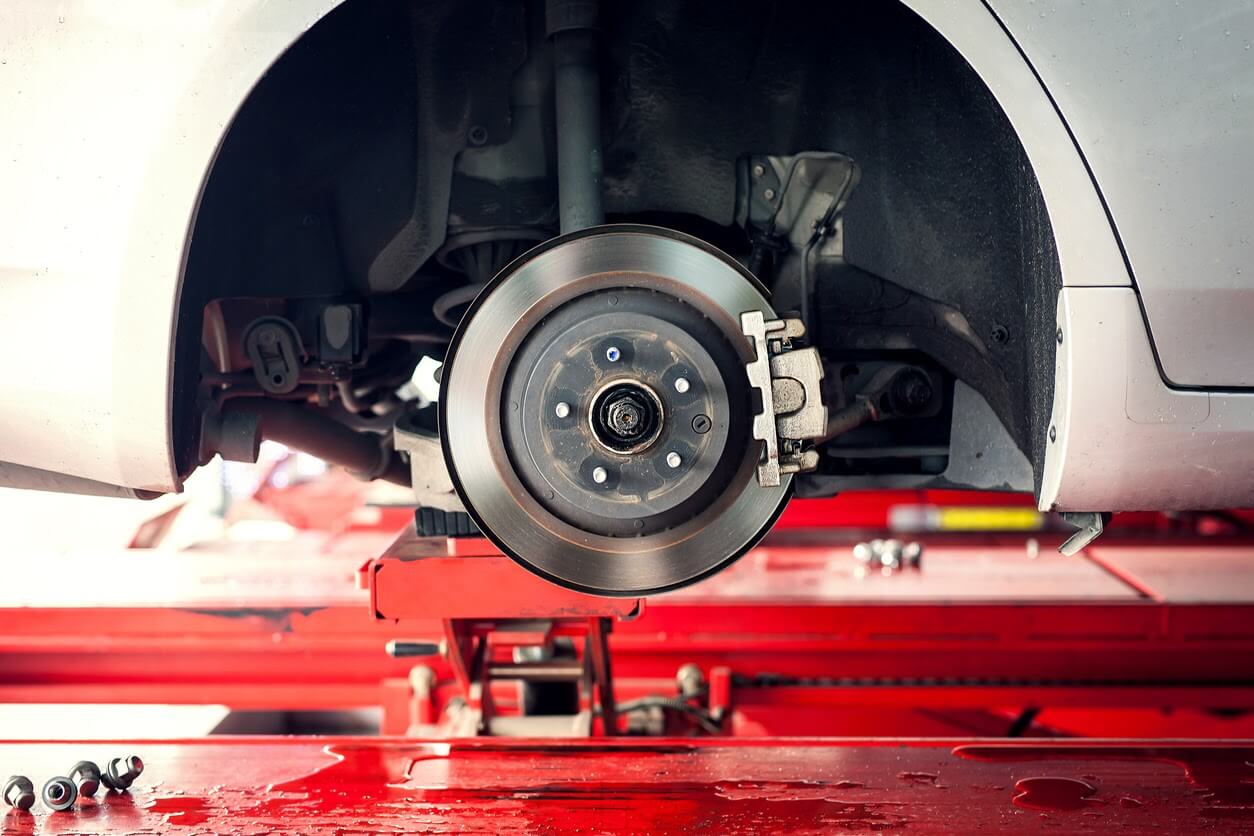 Vehicle at service centre having a brake disc service.