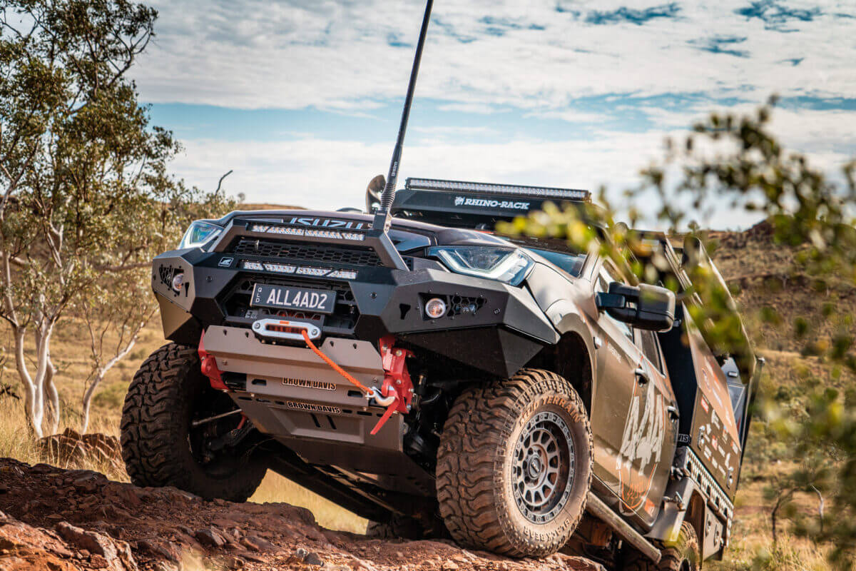 Isuzu DMax crawling over a rocky hill climb with ROH Assault wheels