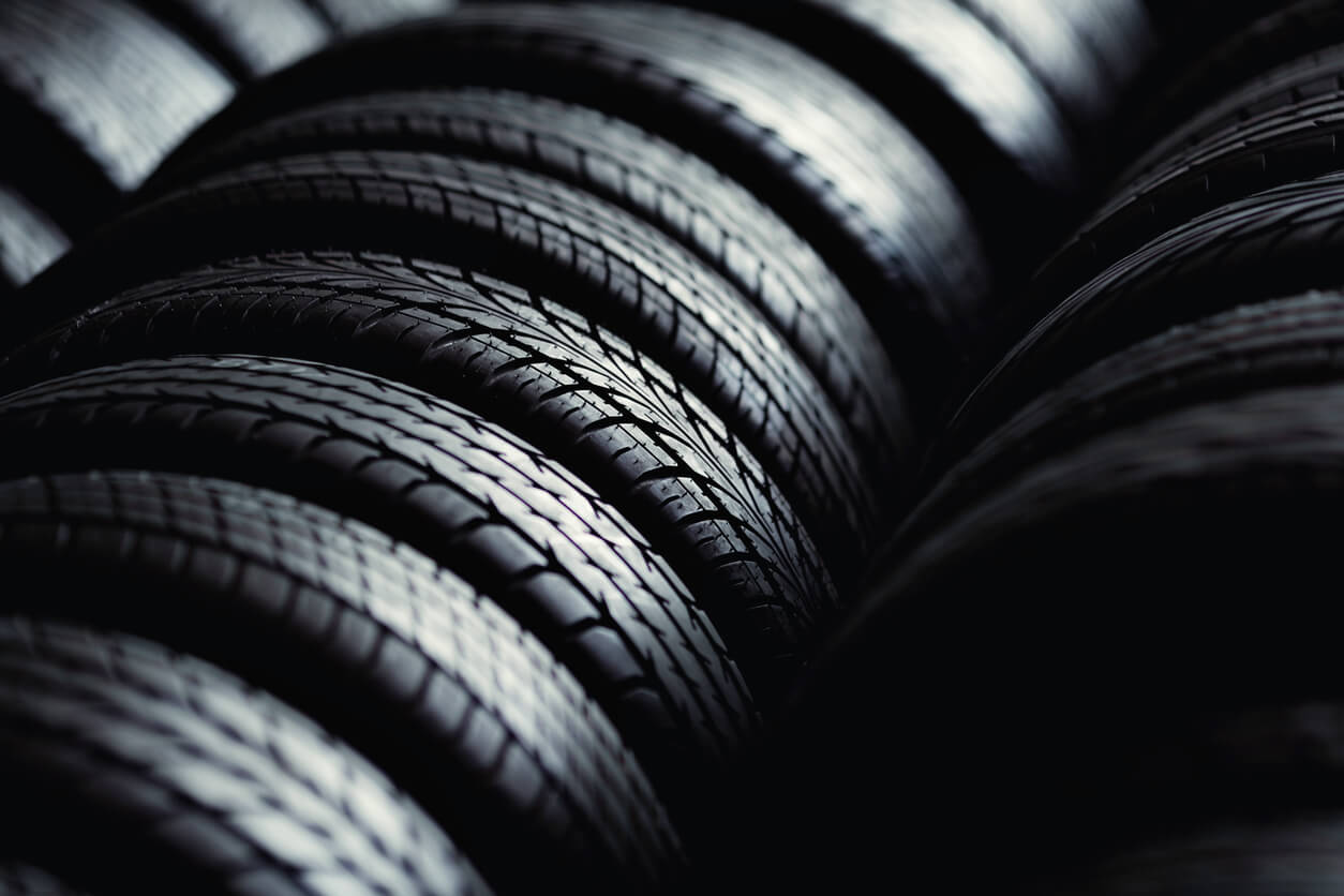 New tyres on rack awaiting fitment to vehicles.