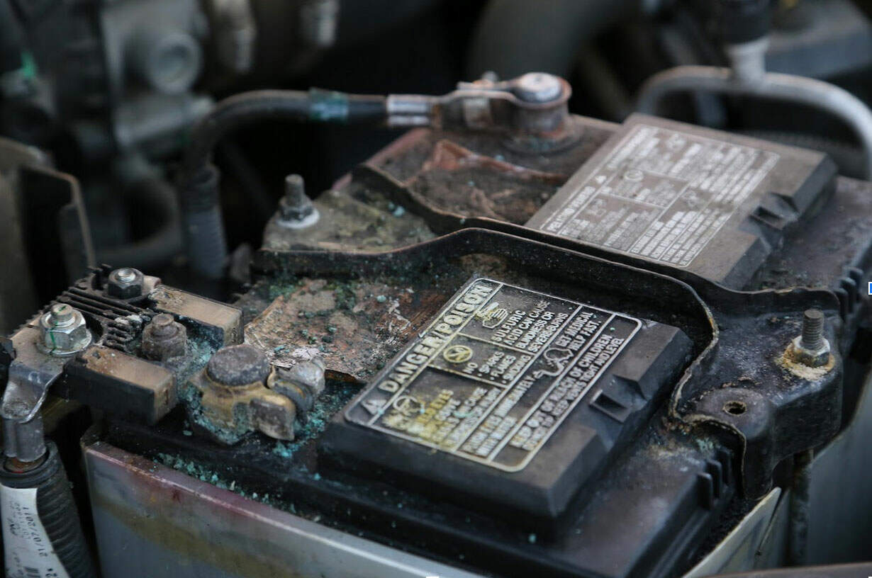 Clear evidence of battery corrosion leading to failure and an unsafe vehicle.
