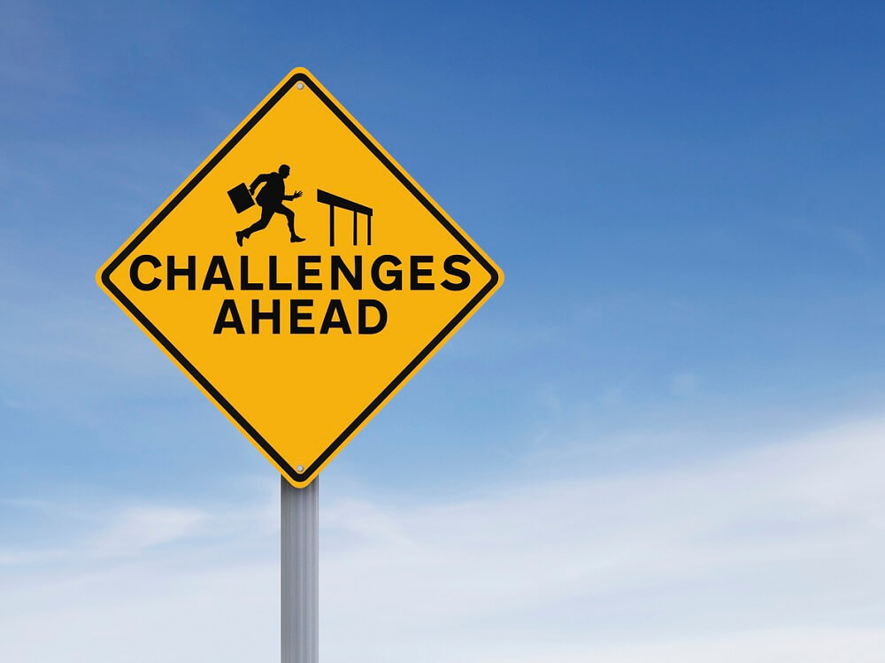 Challenges ahead sign.