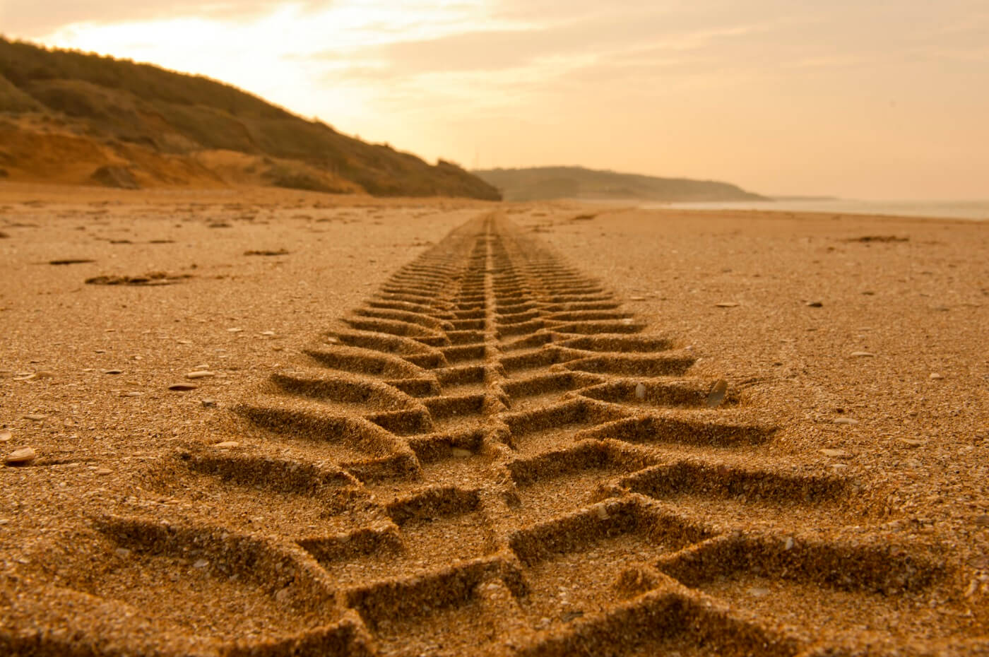 Tyre tracks in the sand