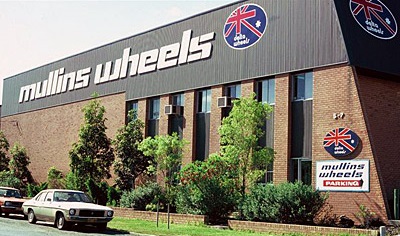 Brick building with Mullins Wheels branding on a Sydney warehouse.