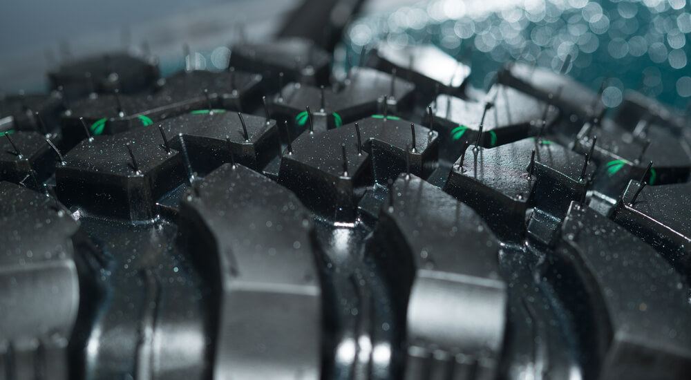 Close-up image of a car tyre showing the small rubber ‘hairs’ on the tread.